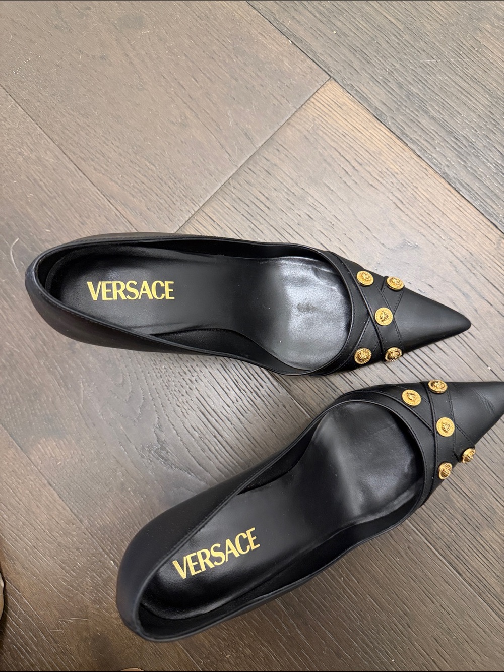 Versace Black Pointed Leather Flats with Gold Medallion Details
